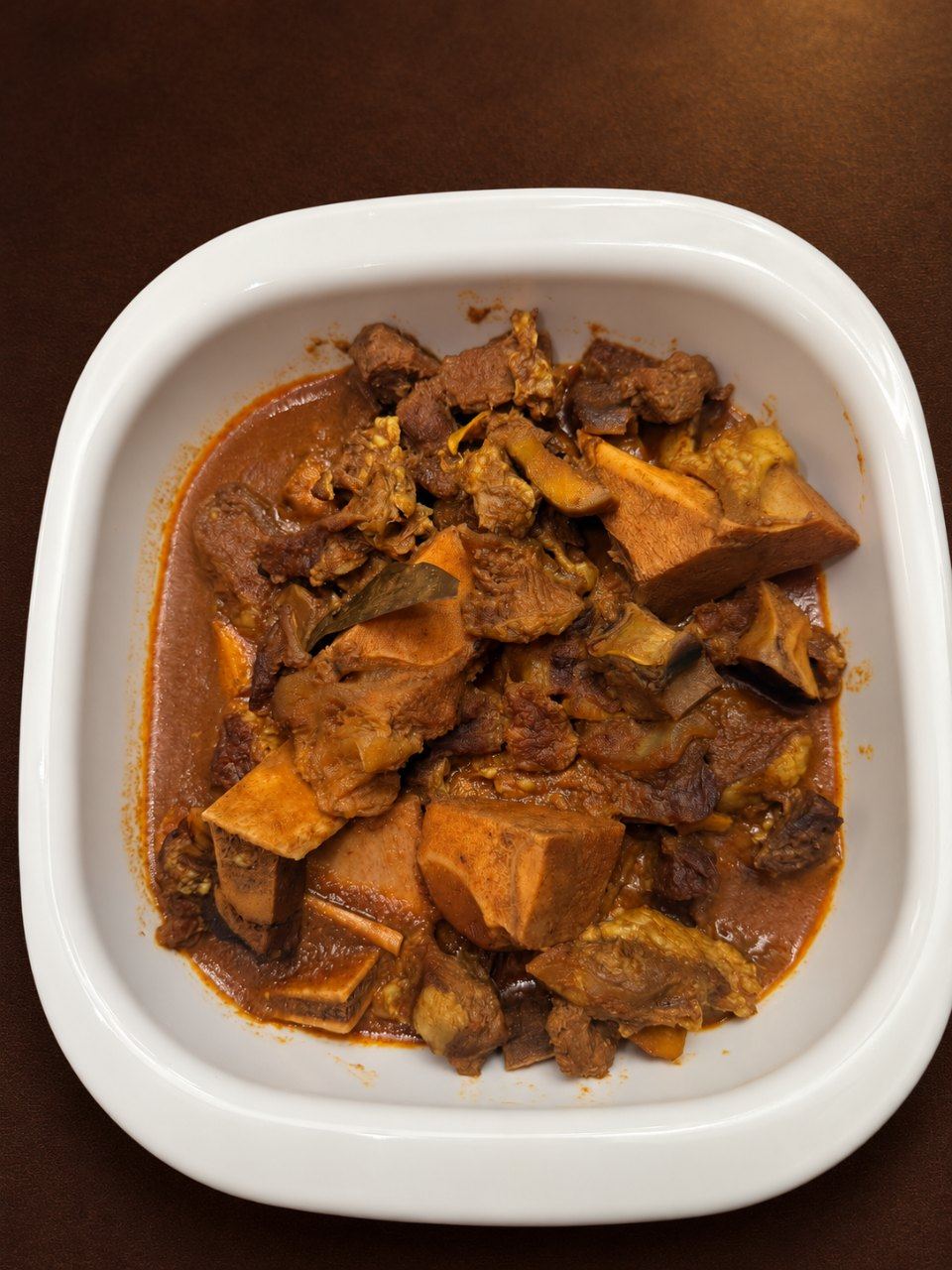 Beef curry in a white dish
